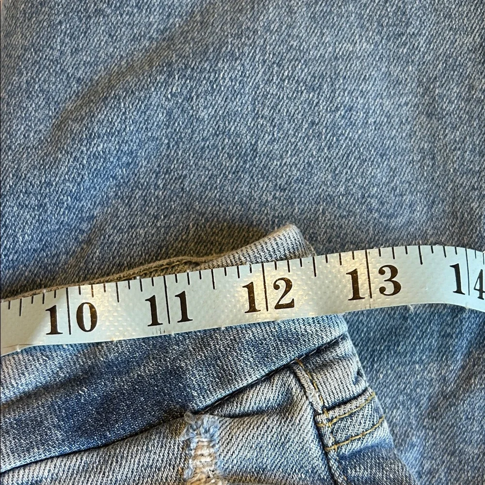 Classic Distressed Skinny Jeans in Blue size 4